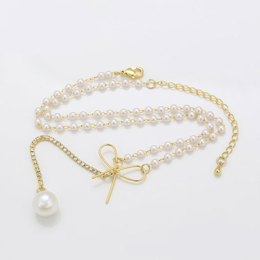 Golden Bow Pearl Necklace