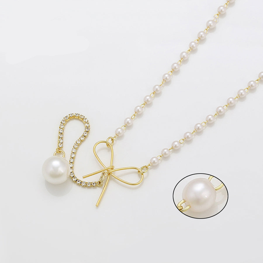 Golden Bow Pearl Necklace